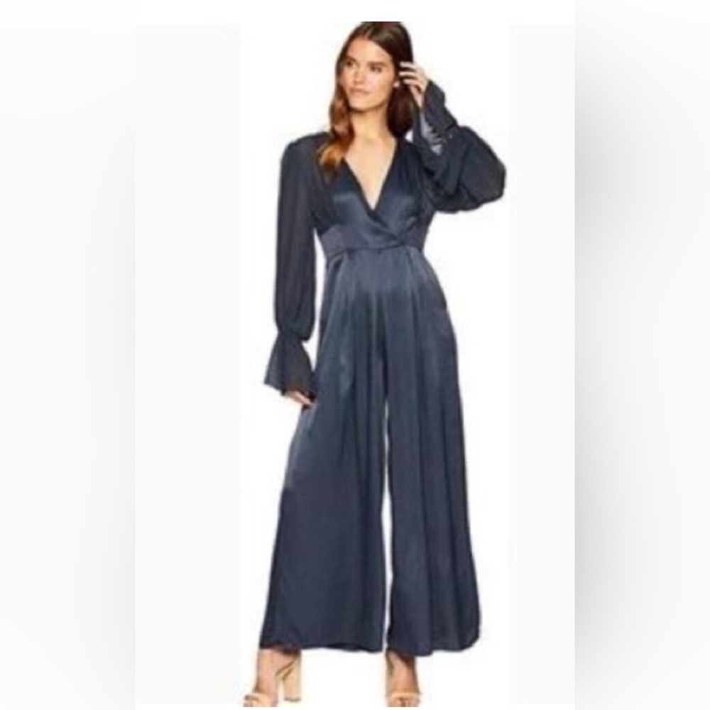 FREE PEOPLE "Not Your Baby"
Satin Wide Leg Deep V High Waist Jumpsuit Size S